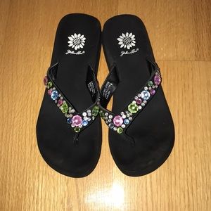 Women’s yellow box flip flops